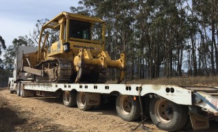 Drake Quad Axle Deck Widener and Prime Mover for hire 1