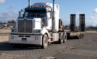 Prime Mover with Tri Axle Float 1