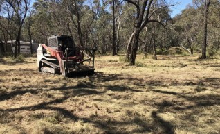 100HP Track Loader w/forestry mulcher 1