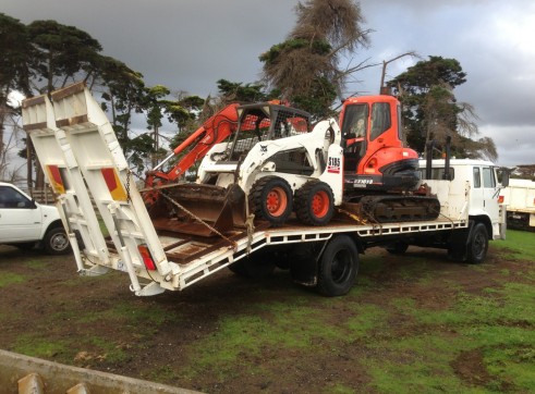 6 tonne excavator & bobcat combo on flatbed