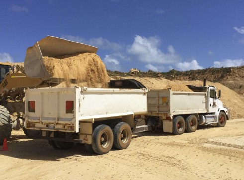 Tipper and pig trailer