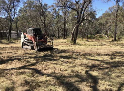 100HP Track Loader w/forestry mulcher 1