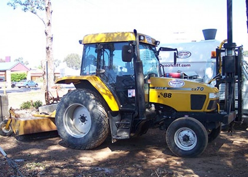 Case Tractor w/ Auger and Broom 1