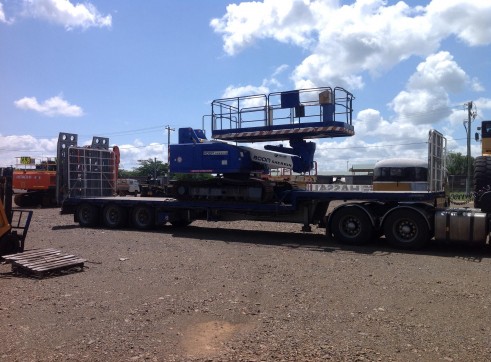 2012 prime mover and drop deck trailer with ramps 3